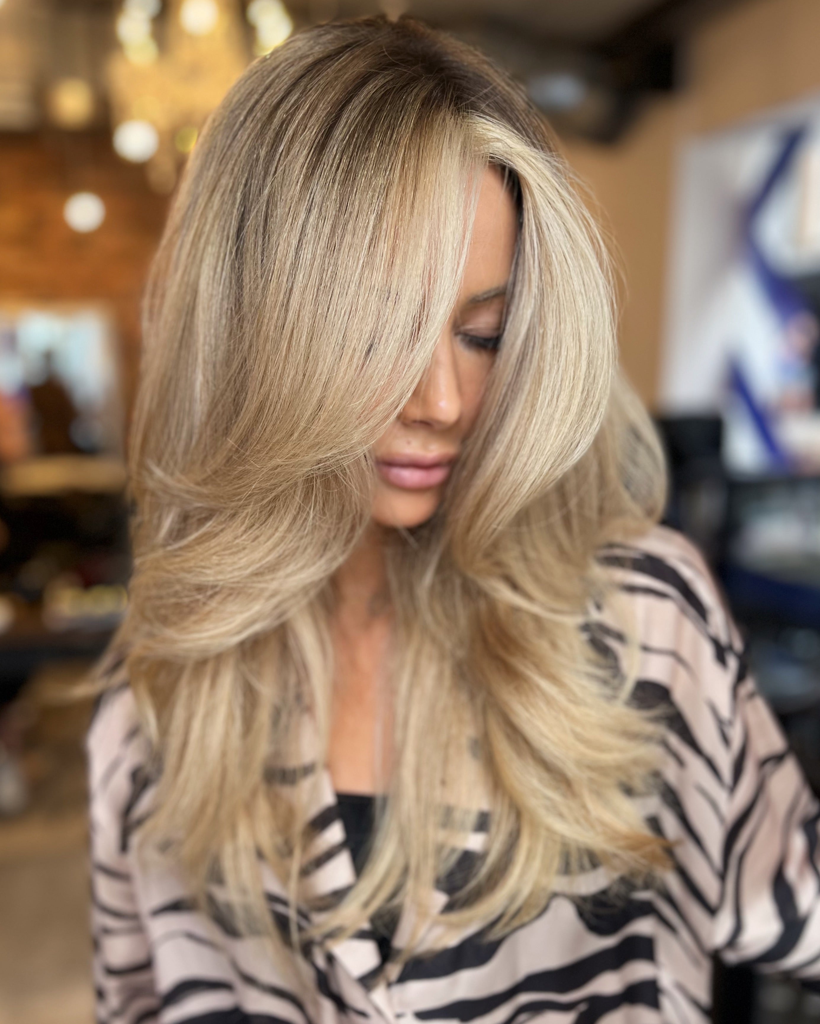 Blonde shiny hair, infused with BOHEMA HAIR Oil